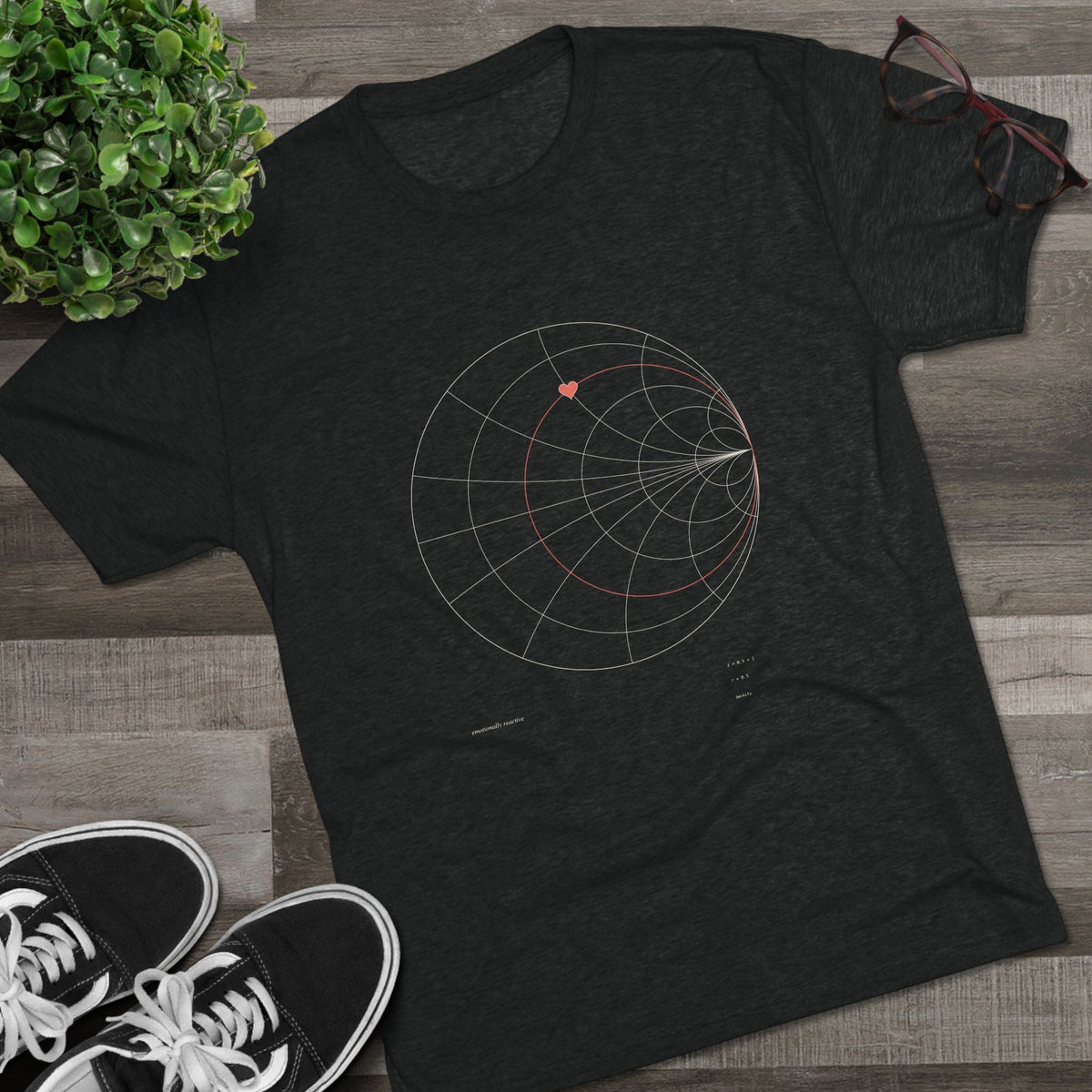 Black tee with Smith chart print, flat lay with sneakers