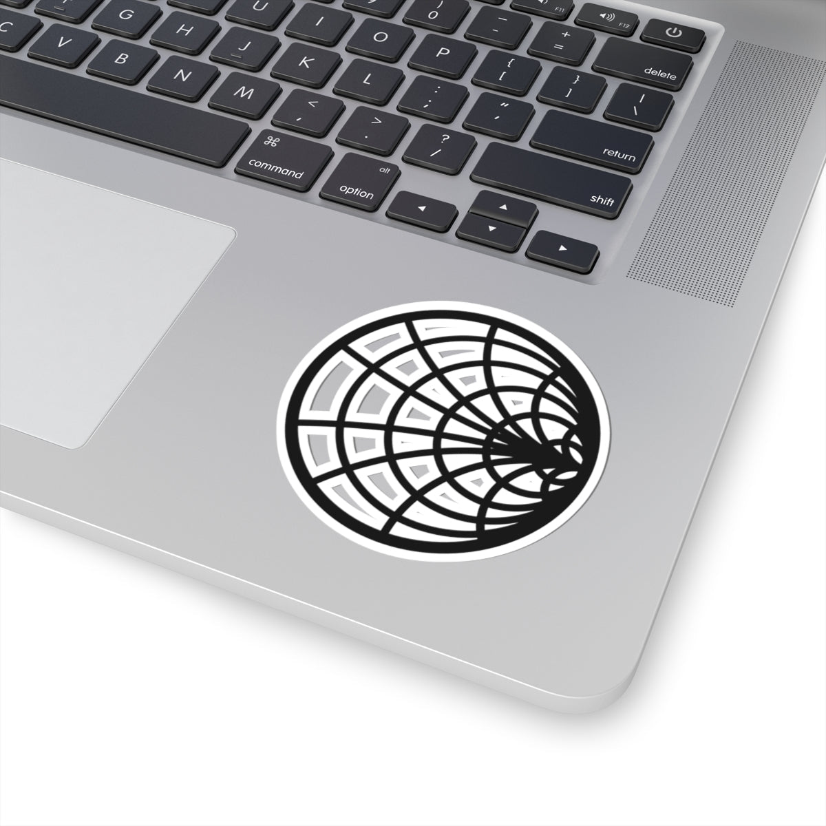 Smith chart sticker on a silver laptop
